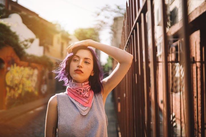 hipster with purple hair traveling