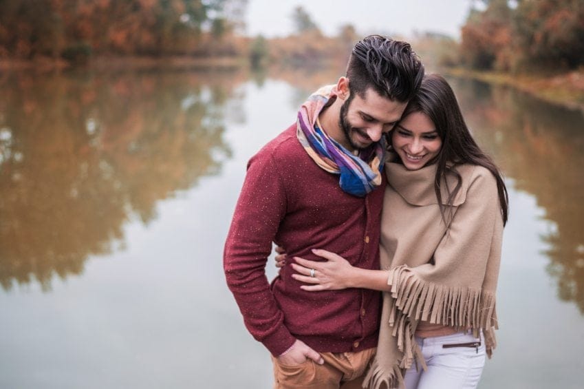 Happy couple walking in nature