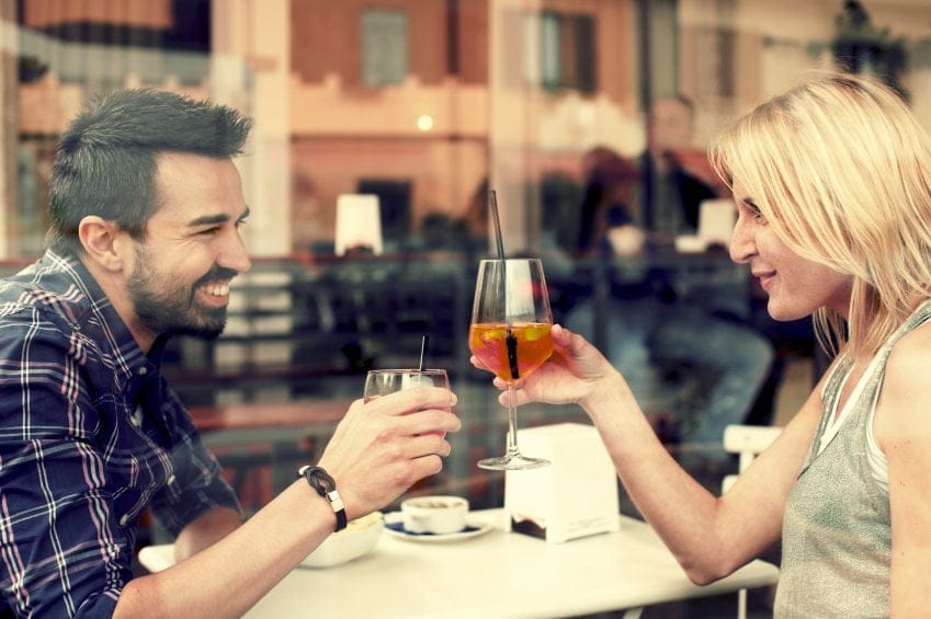 Couple drinking at bar
