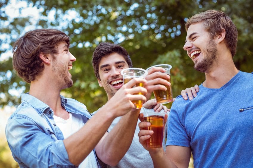 Group of males drinking