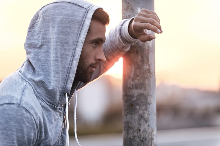 young man side view sunset