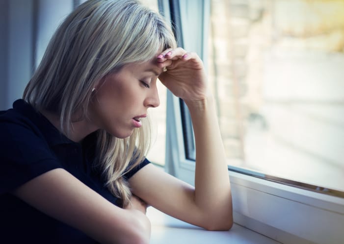 Portrait of depressed young woman.