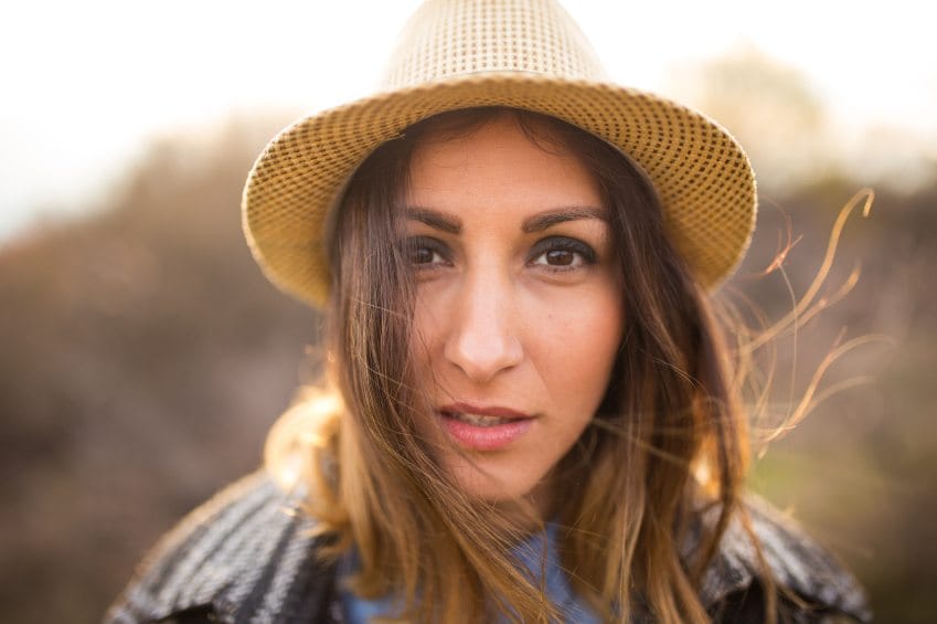 Brunette wearing hat