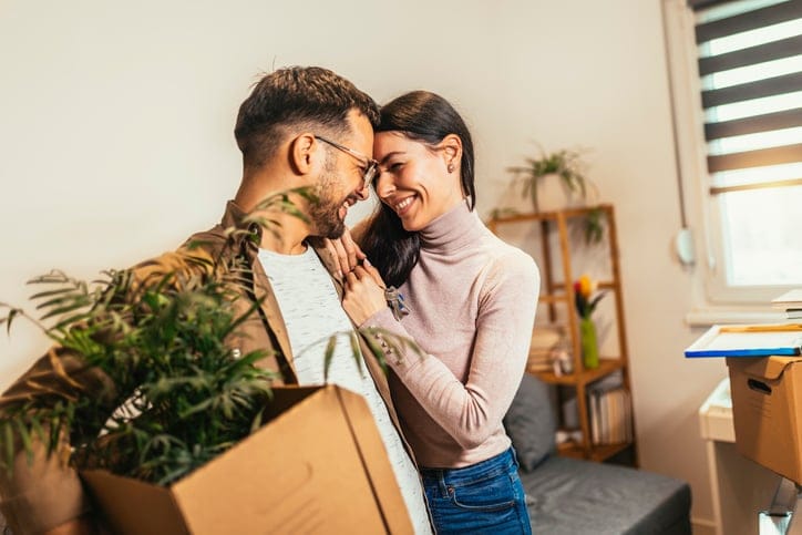 A young couple moving in together.