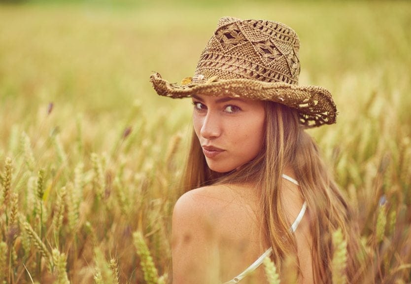 Young country girl in field