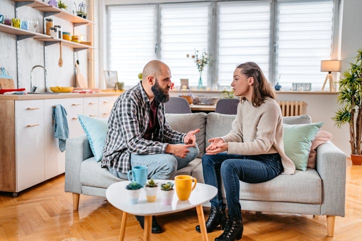 couple fighting in living room