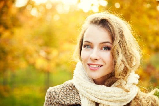 smiling woman in autumn scarf
