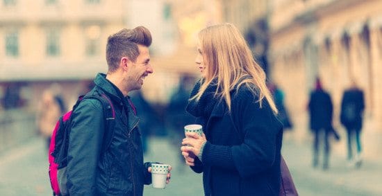 couple having conversation over coffee