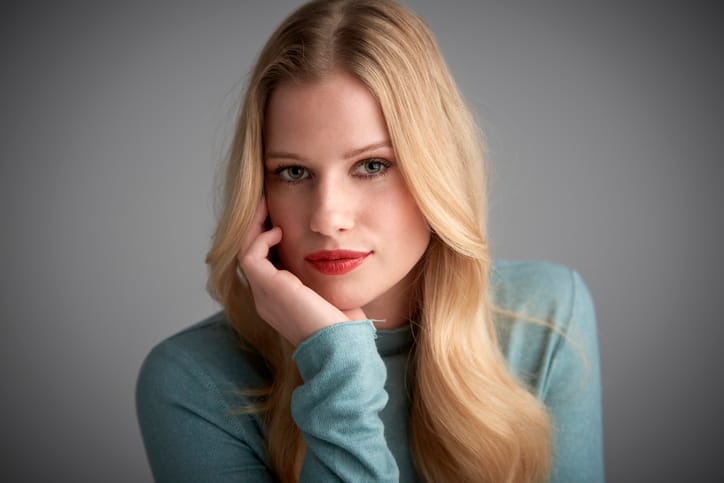 blonde serious woman front facing