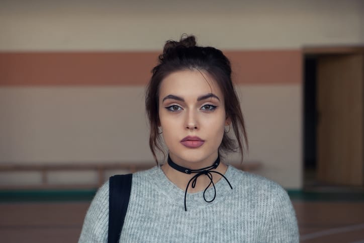 brunette young woman solemn