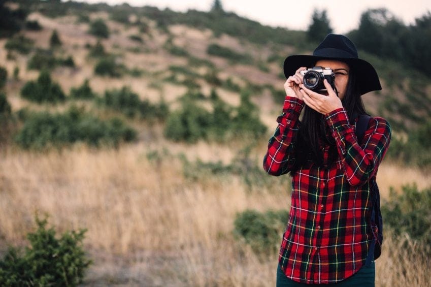 woman taking pictures