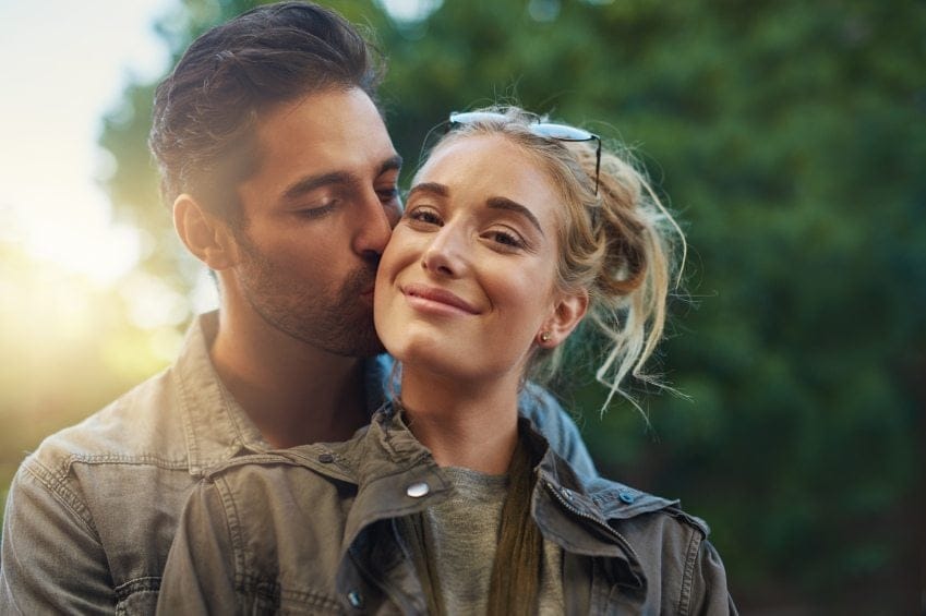 couple hugging and smiling