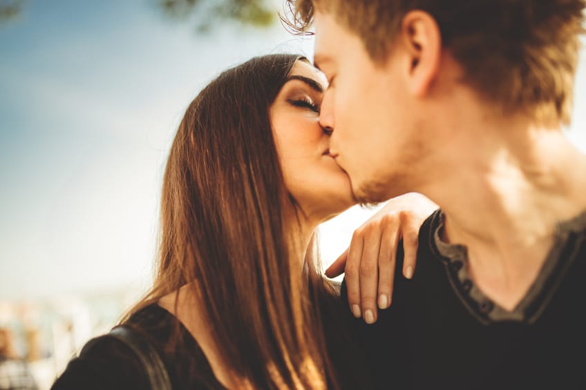 Passionate couple kissing