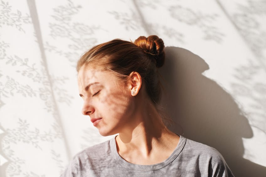 Portrait of young woman with closed eyes