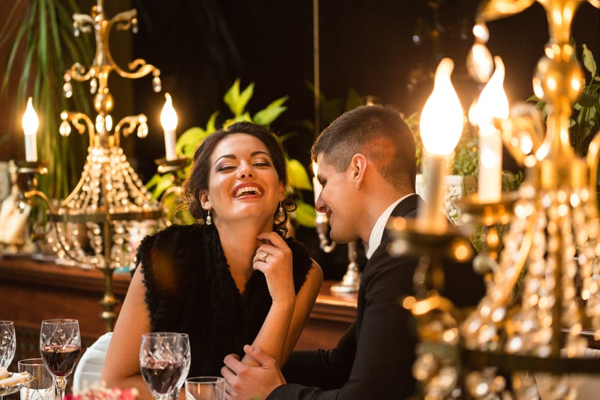 Elegant couple enjoying dinner