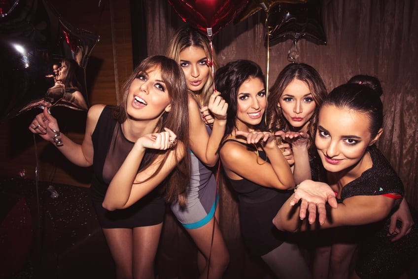 friends blowing kisses girls party