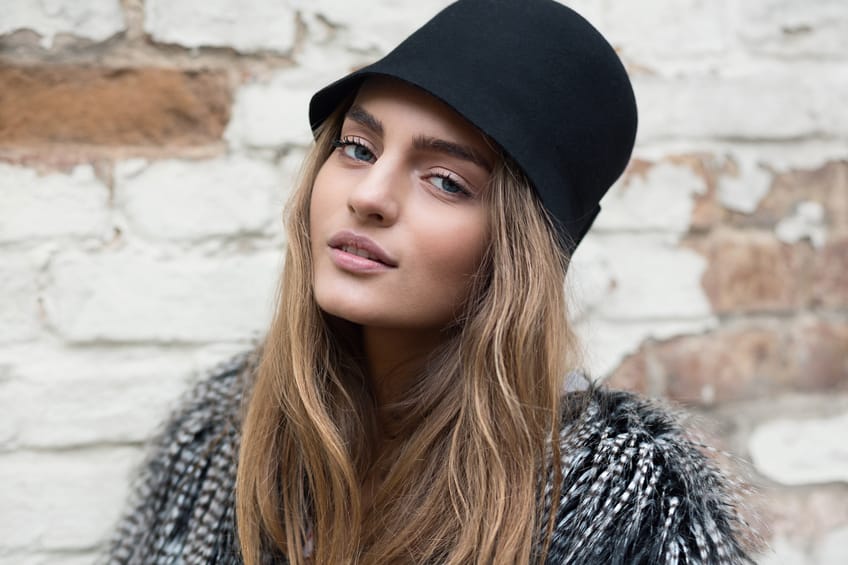 Young brunette wall hat