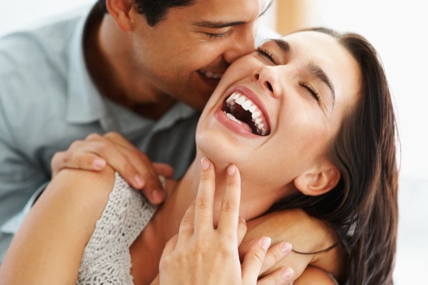 couple laughing happy romantic