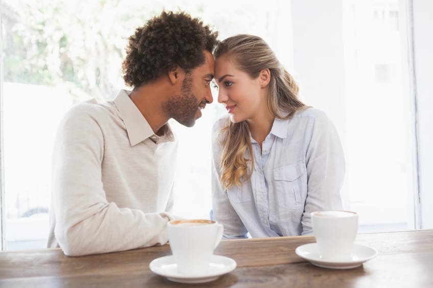 Happy couple on a date at the coffee shop