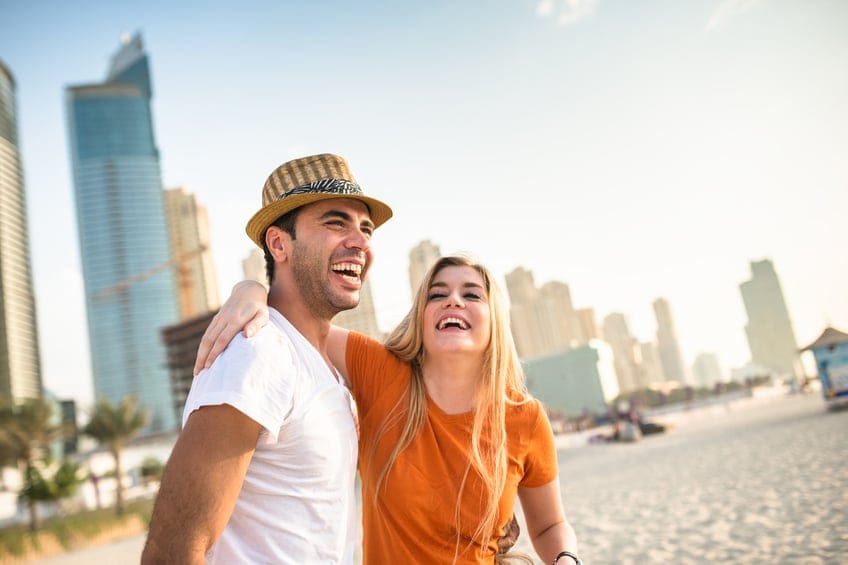 couple beach sunshine happy