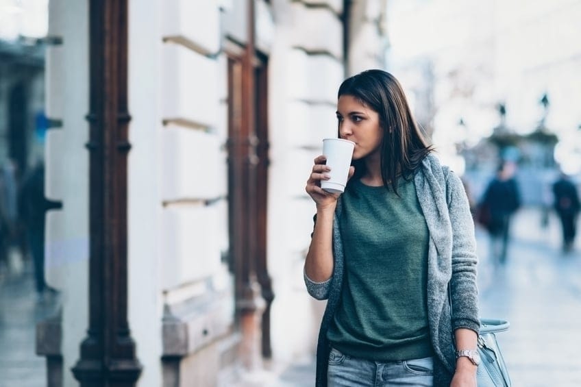 woman coffee walking city