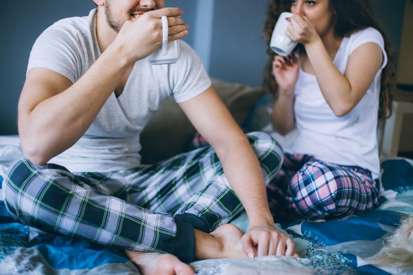 couple coffee bed morning