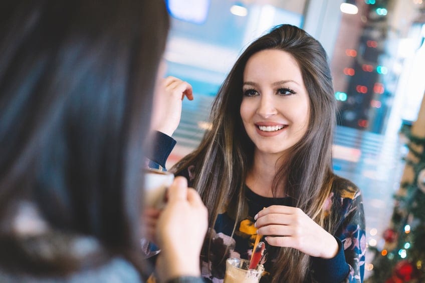 Girls talking and having a coffee