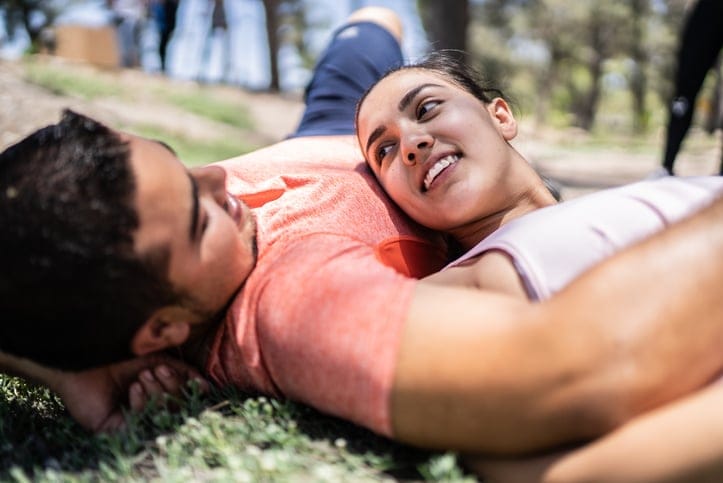 romantic couple relaxing in park