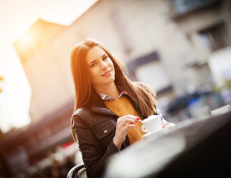 single woman happy cafe sun coffee