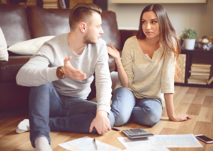 Young beautiful couple in home interior