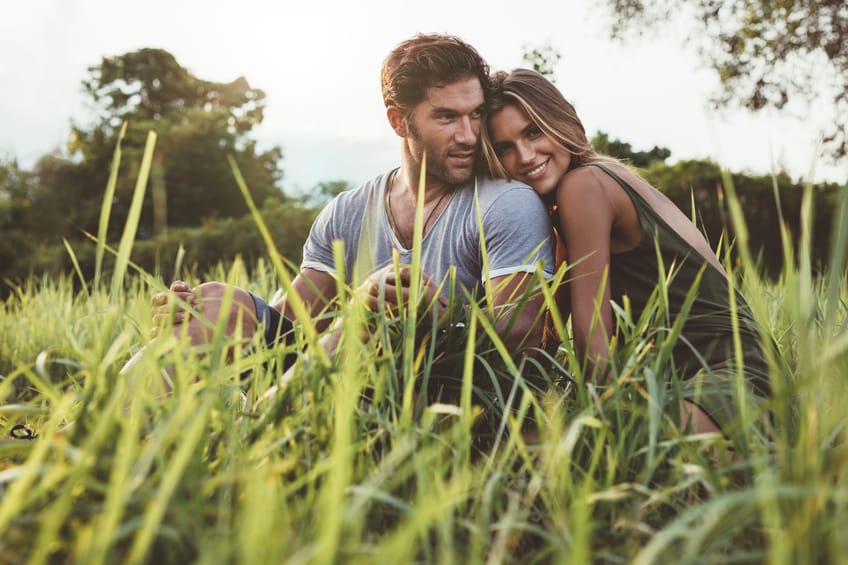 couple field grass romance love