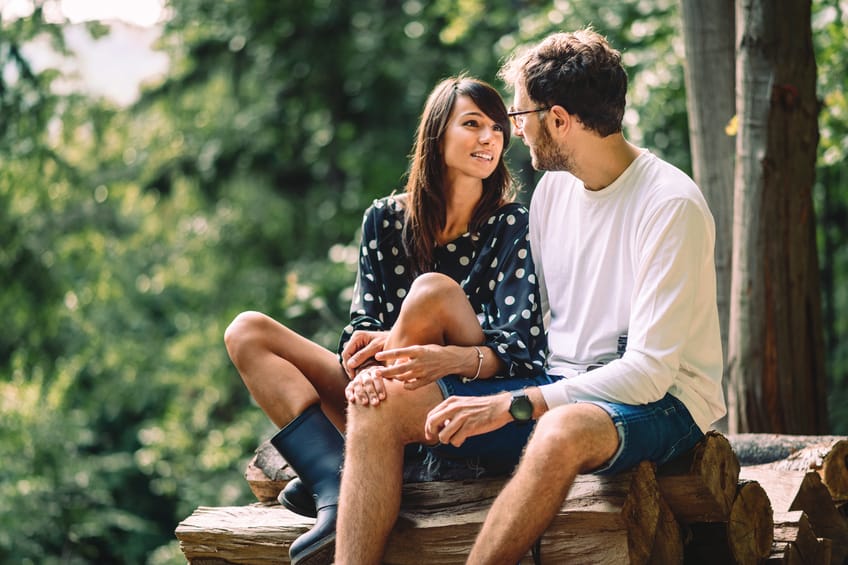 A young couple spending time together in the park.