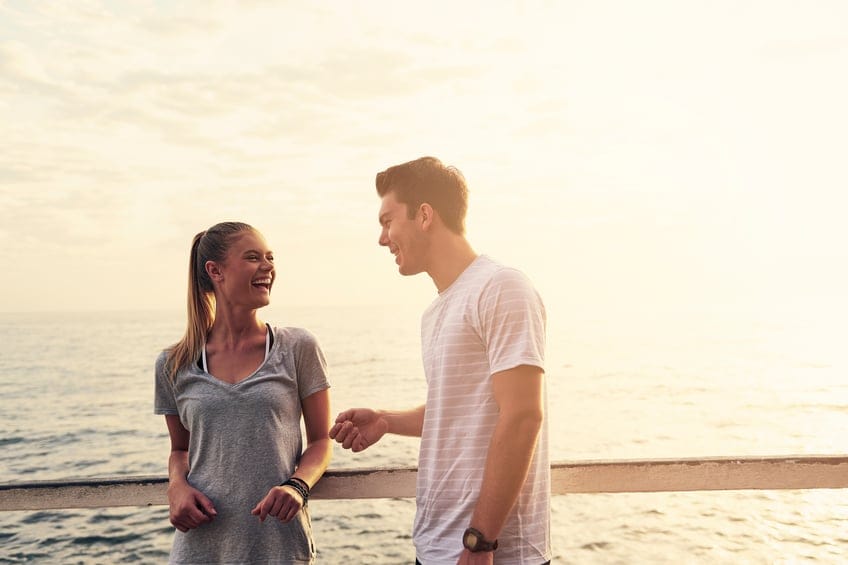 couple chat beach outdoors sunset
