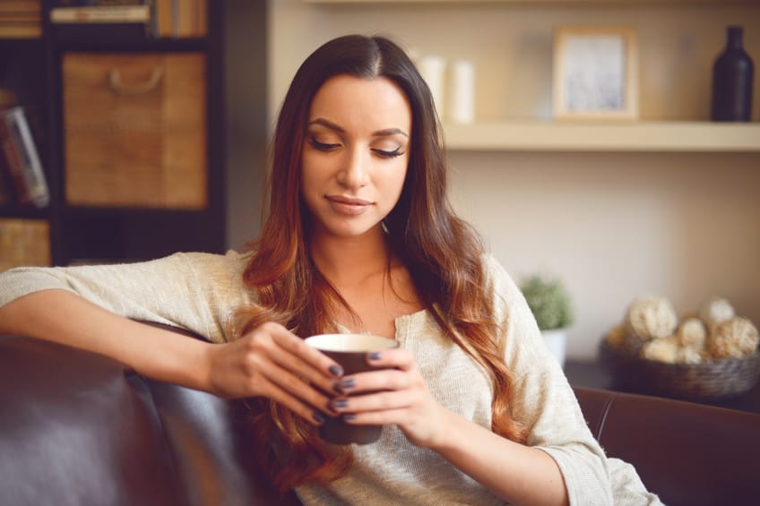 young brunette woman in home interior