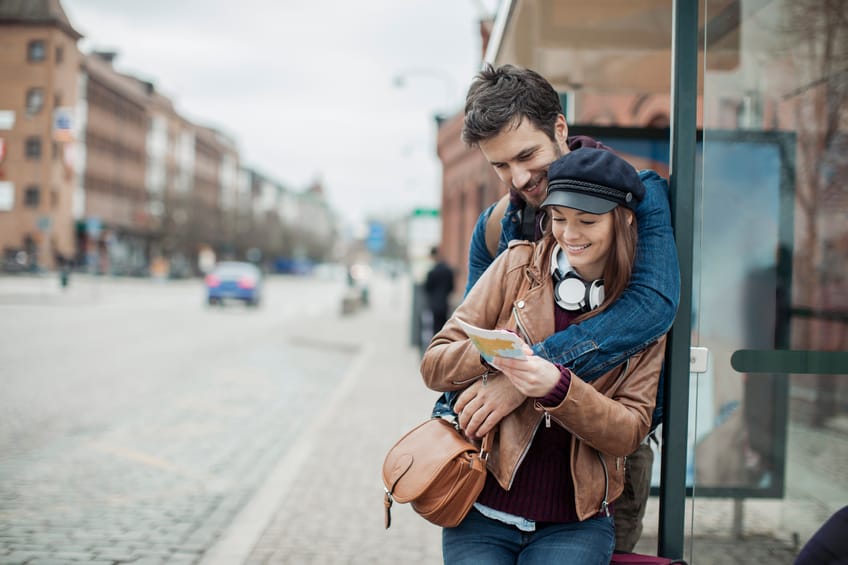 Photo of a couple at bus station