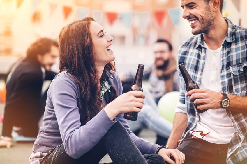 couple flirting happy beer party