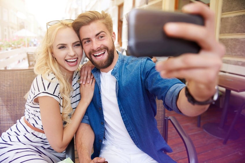 couple selfie outside vacation