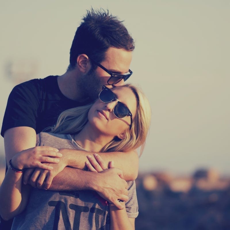 couple hugging close