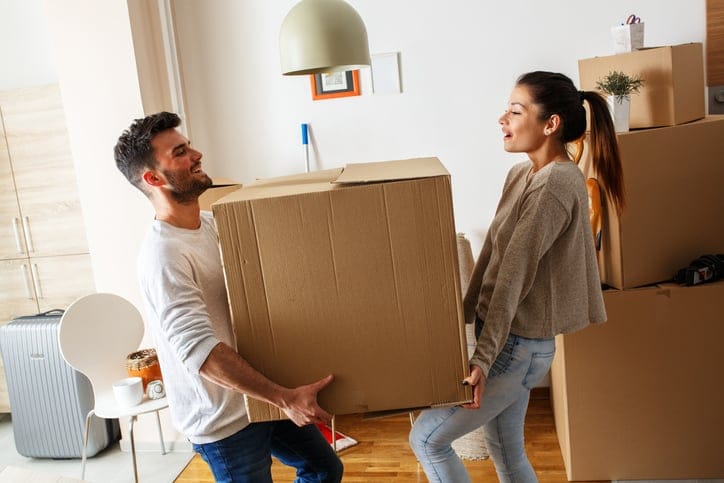 Couple moving boxes.