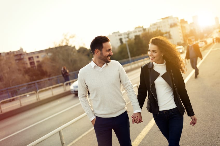 Beautiful couple exploring city and bonding