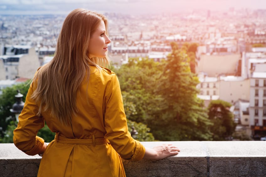 Woman at observation point of Sacred Heart Basilica, Paris, France.