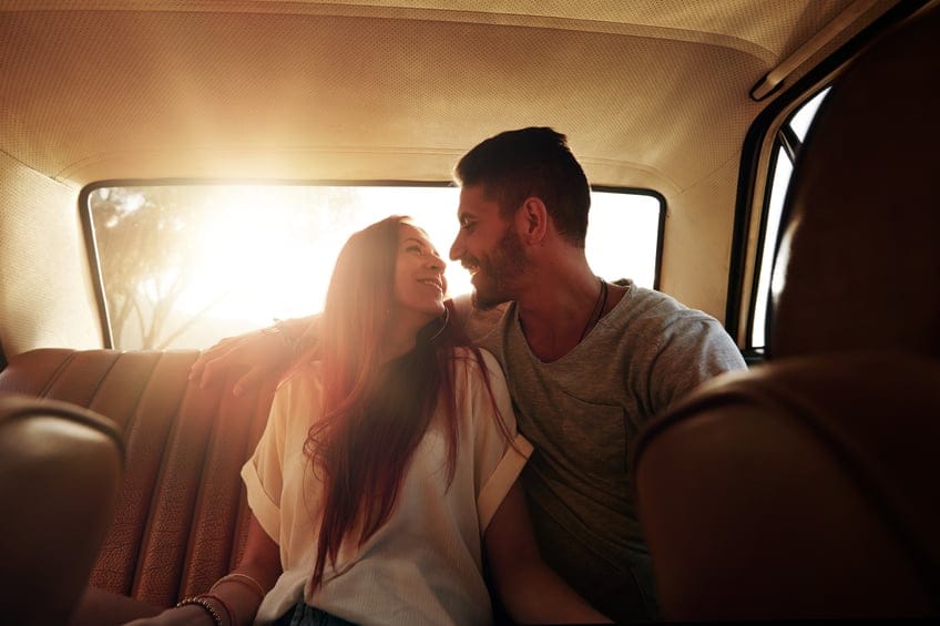 couple kissing car romance love