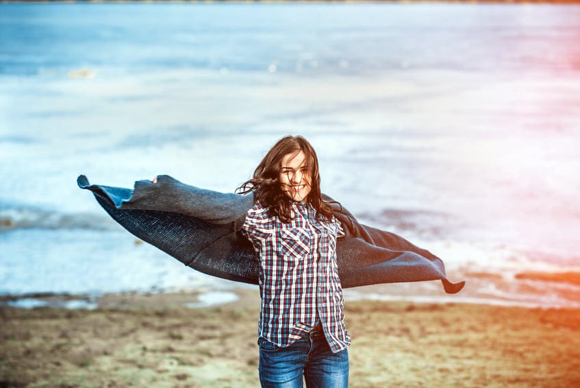 happy young woman beach alone sun