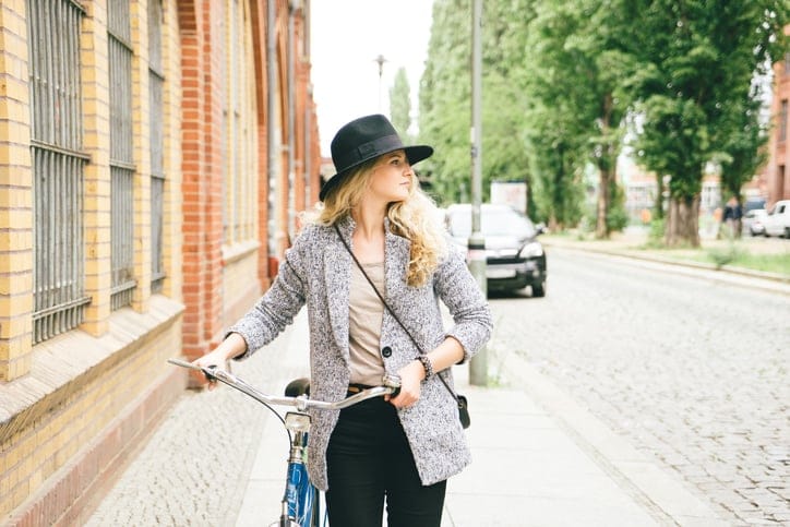 young woman bike hipster city