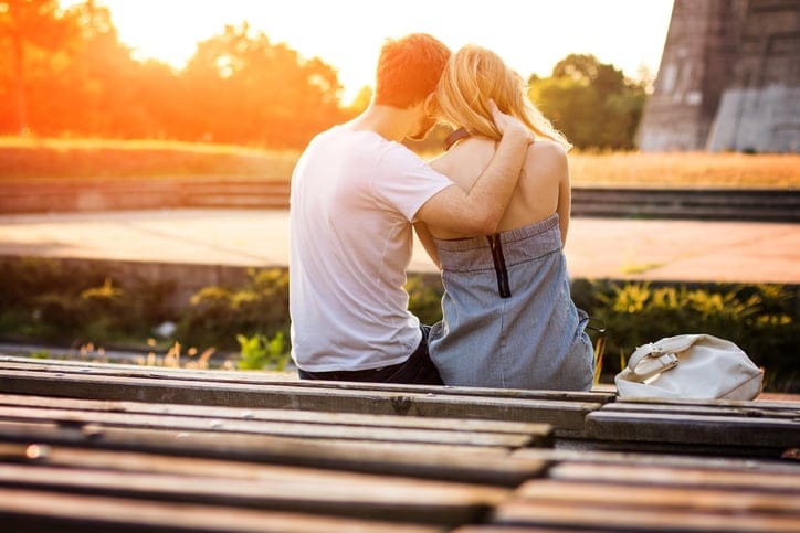young couple pier outdoors romance