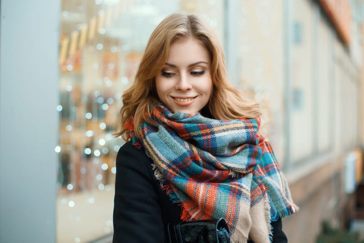 young woman happy outdoors portrait scarf