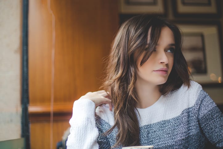 young woman cafe alone hipster serious
