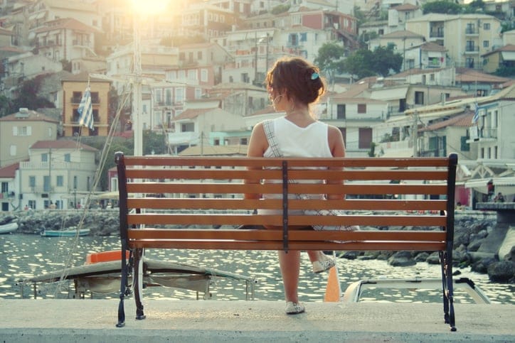 Girl alone bench