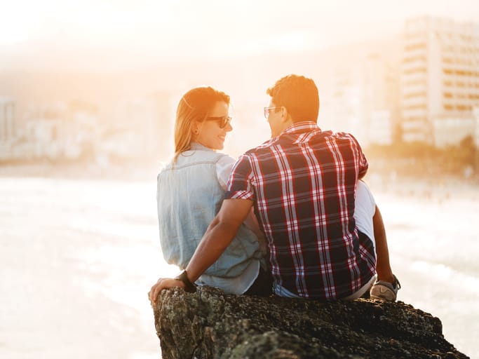 young couple happy sunset outdoors