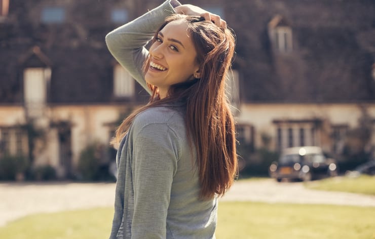 Smiling woman enjoying the sunny day